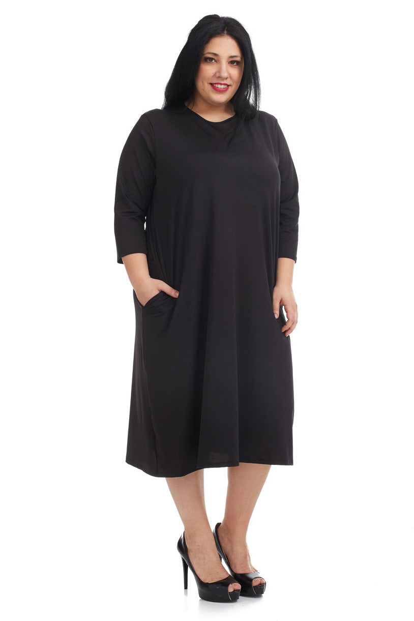 Soft and cozy plus size cotton black t-shirt dress with pockets. modest 3/4 sleeves and knee length