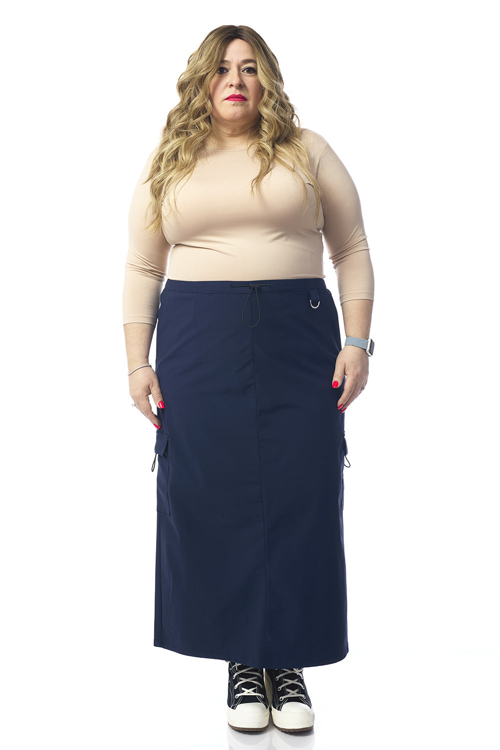 woman wearing navy blue cargo skirt with pockets 