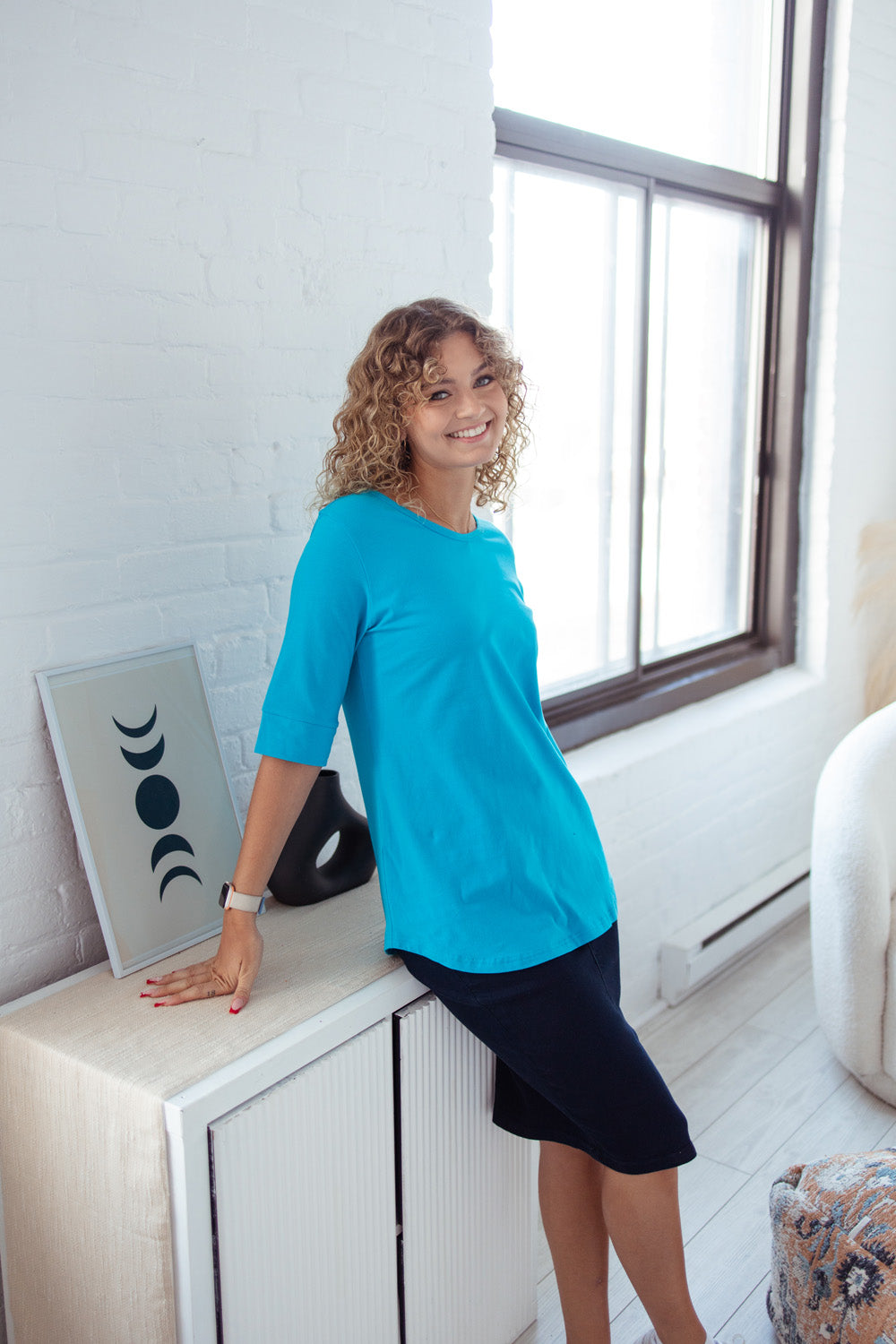blue elbow sleeve cotton top with cuff sleeves and rounded hem
