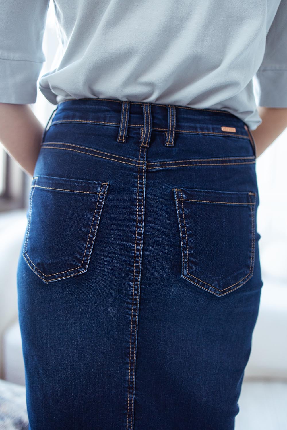 blue stretchy tznius knee length jean skirt with pockets