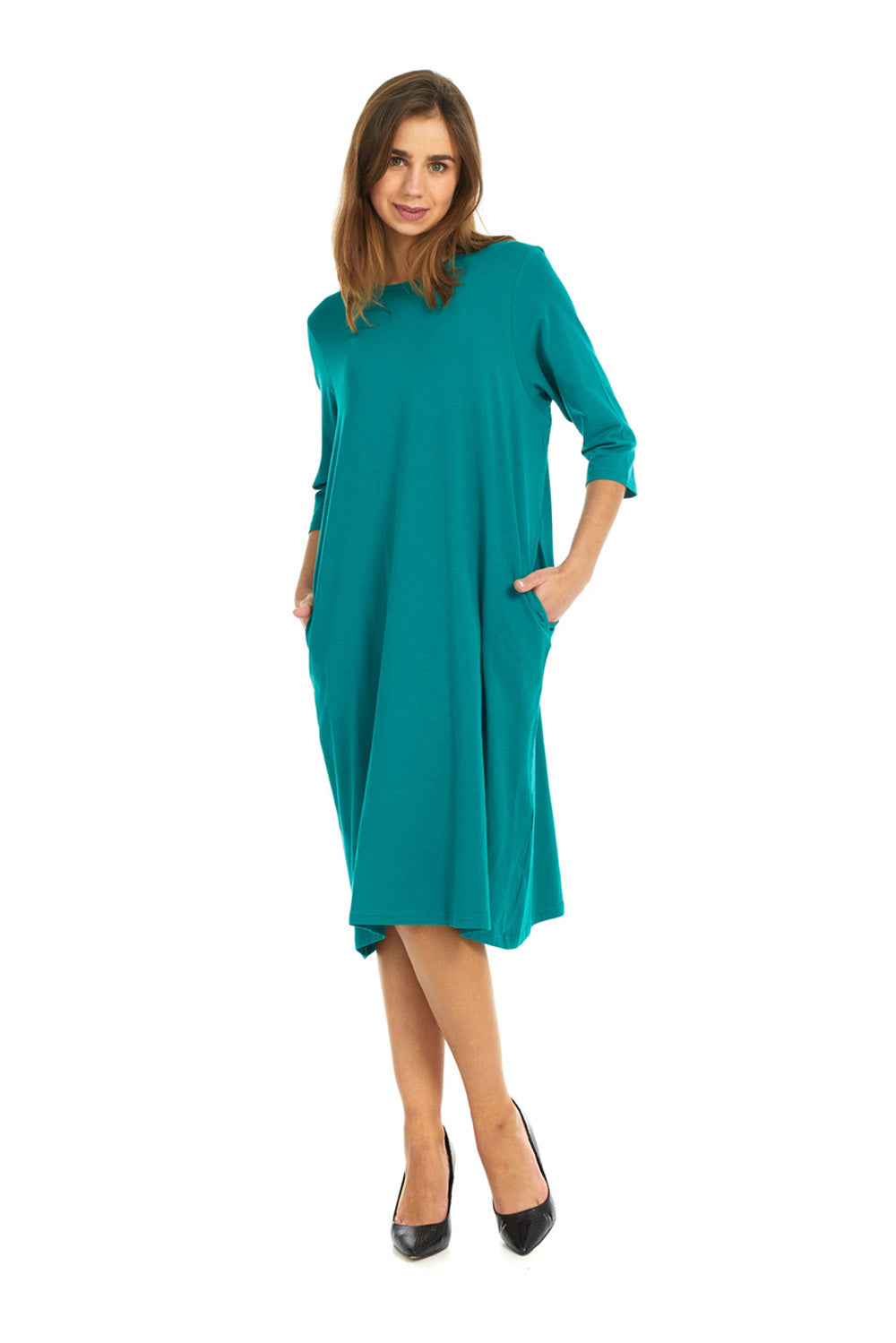 Soft and cozy cotton teal t-shirt dress with pockets. modest 3/4 sleeves and knee length